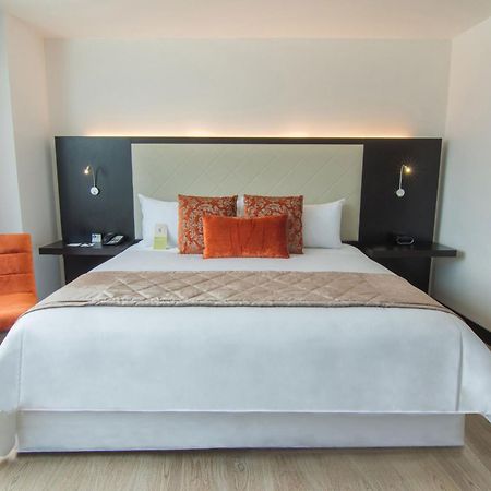 Four Points By Sheraton Cuenca Exterior foto A bedroom at the hotel