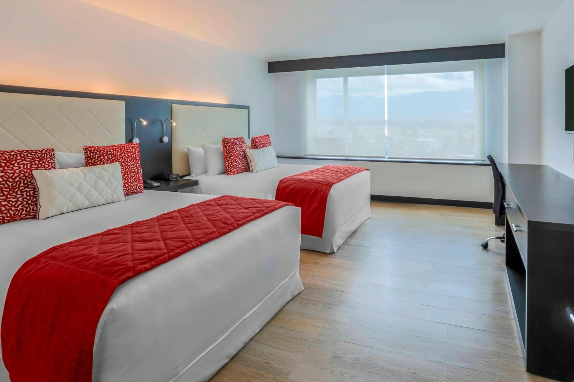 Four Points By Sheraton Cuenca Exterior foto A room at the hotel